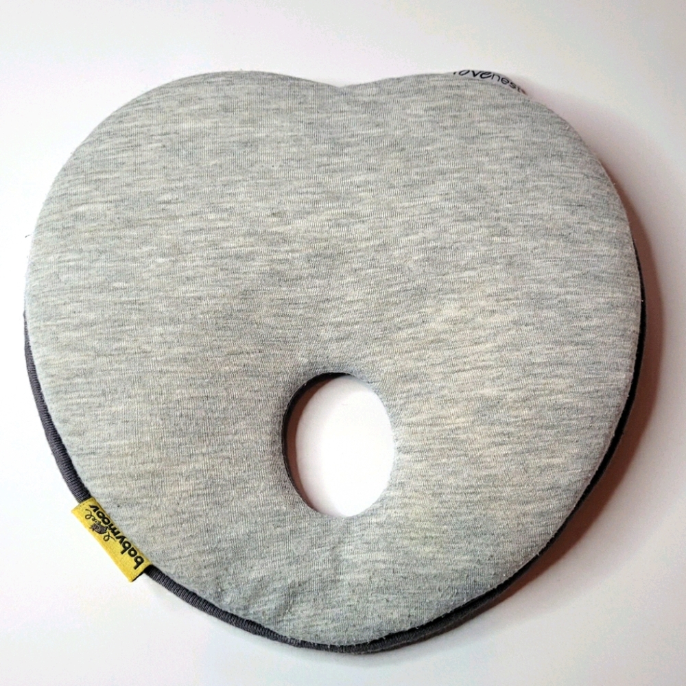 Infant pillow to help with babies head roundness.